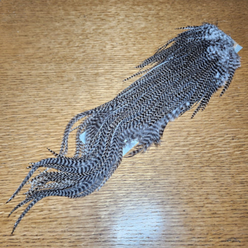 Hareline Grizzly Half Saddle – Natural AVAILABLE AT TROUTLORE FLY TYING STORE AUSTRALIA