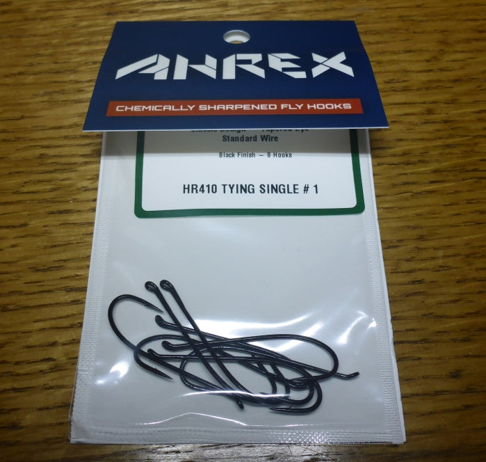 Three Spey style salmon flies: Spey Dog and a freestyle tied on Ahrex Hooks HR410 size 2/0. Lady Caroline on same hook in size 1 Three Spey style salmon flies: Spey Dog and a freestyle tied on Ahrex Hooks HR410 size 2/0. Lady Caroline on same hook in size 1