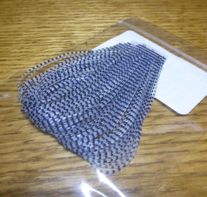 Grizzly Flutter Legs Black Barred Clear UV Pearl