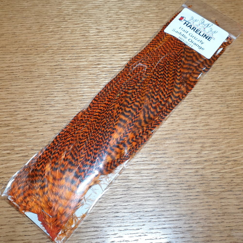 Hareline Grizzly Half Saddle – Orange - Troutlore Fly Tying Hackle Feathers Australia
