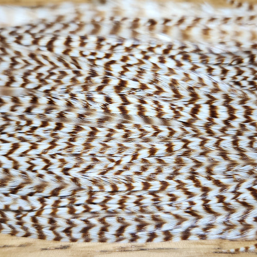 Hareline Grizzly Half Saddle – Bleached Grizzly - Troutlore Fly Tying Store Australia