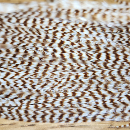 Hareline Grizzly Half Saddle – Bleached Grizzly - Troutlore Fly Tying Store Australia