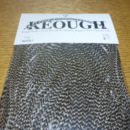 KEOUGH SADDLE GRIZZLY NUMBER #1 GRADE FLY TYING FEATHERS AVALABLE IN AUSTRALIA FROM TROUTLORE FLYTYING STORE
